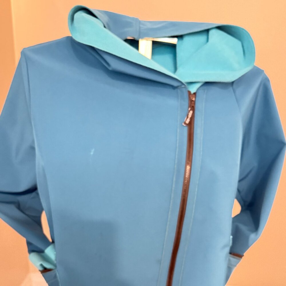 Raincoat  designed by European company Ille-olle, full length style